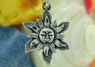 The sun symbol is a small amulet for good luck